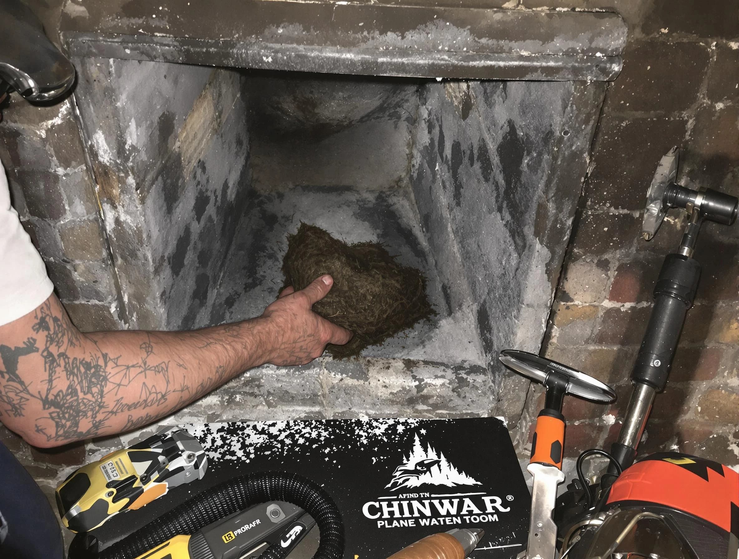 New Brunswick Chimney Sweep safely removing debris and screening chimney in New Brunswick, NJ